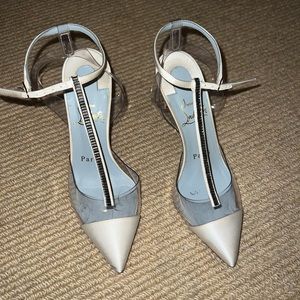 White Christian Louboutin heels